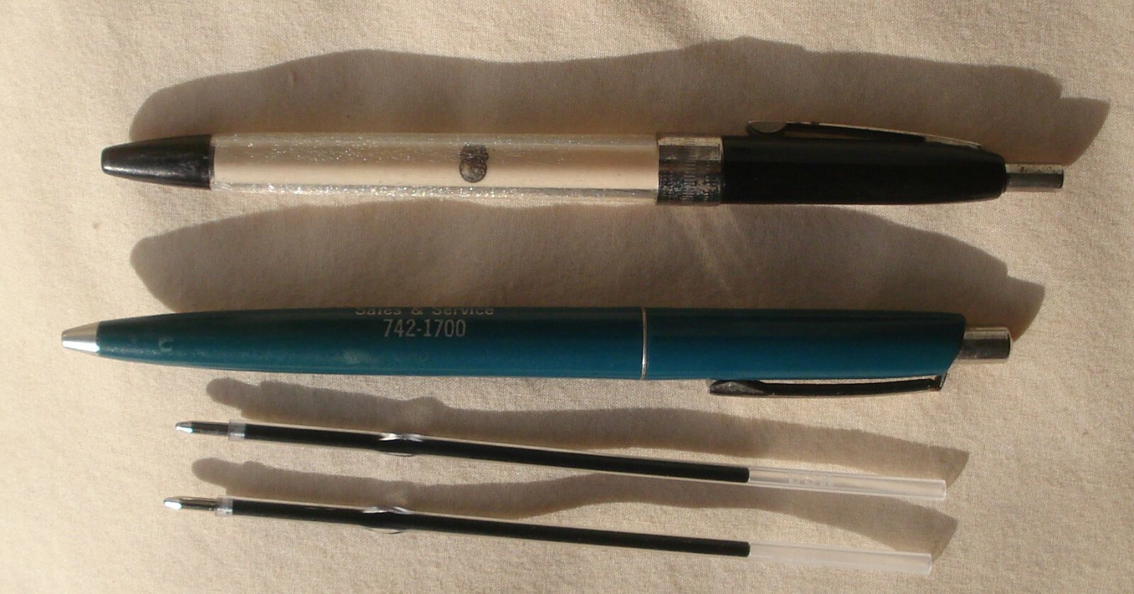 Lot of 2 Vtg Ballpoint Click Advertising Pens w/ Pocket Clip + New Ink Refills