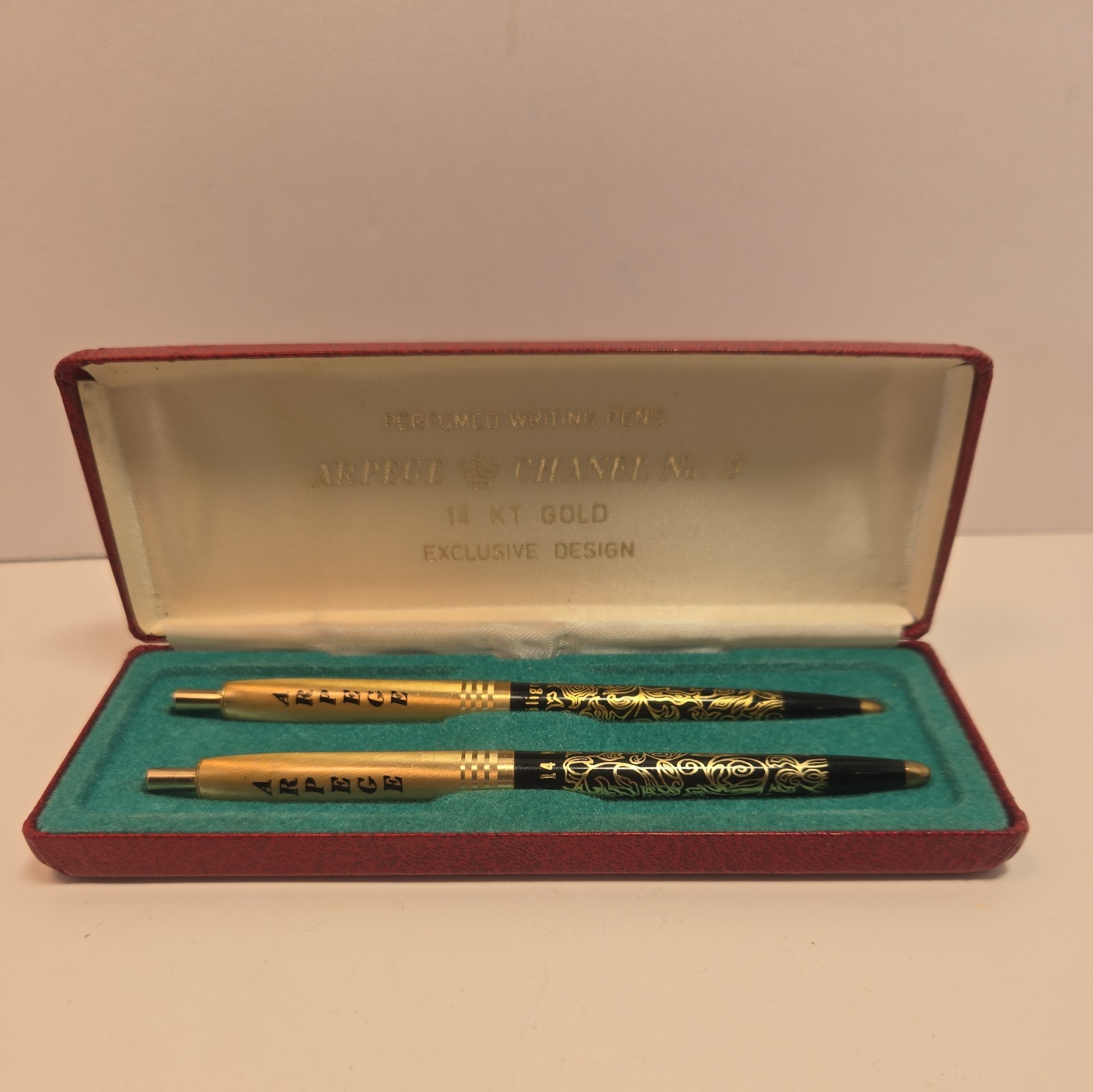 Vintage Set Of Ballpoint Pens Arpege Chanel No 5 14kt Gold ink needs replaced.