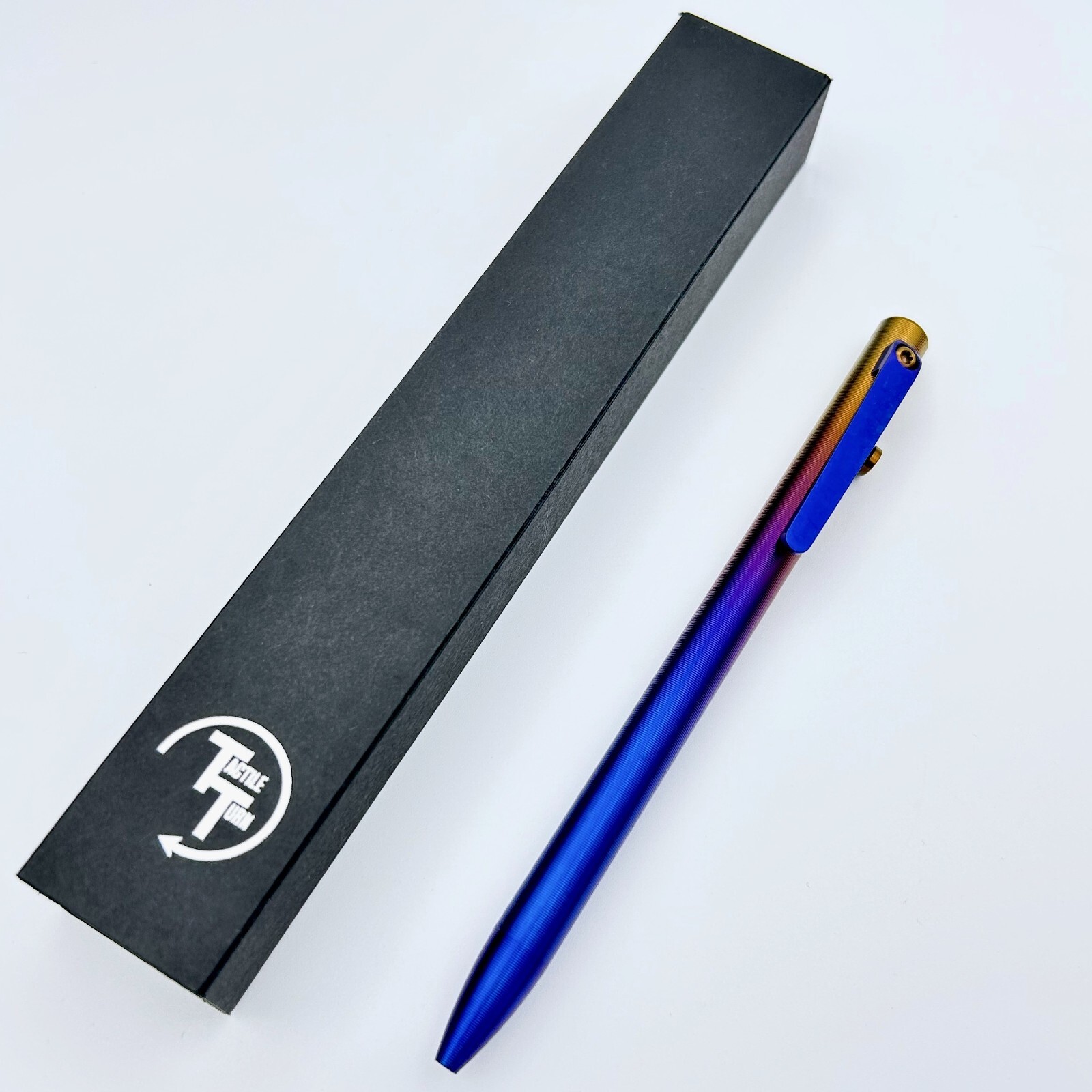 Tactile Turn – Titanium Slim Bolt Action Standard Size Pen Wyo Sunrise Ano Color
