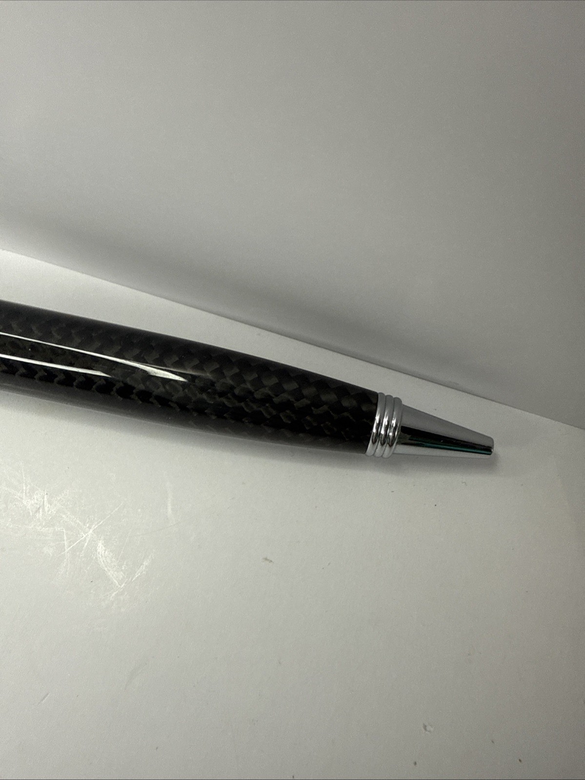 Movado Branded ballpoint pen black and carbon fiber