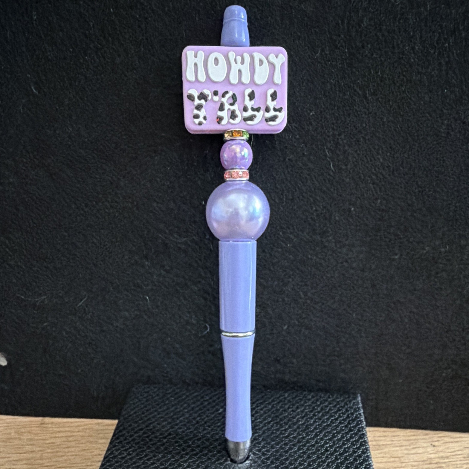 Purple Plastic Ballpoint Pen w/ «HOWDY» Topper, Decorative Beads, Black Ink