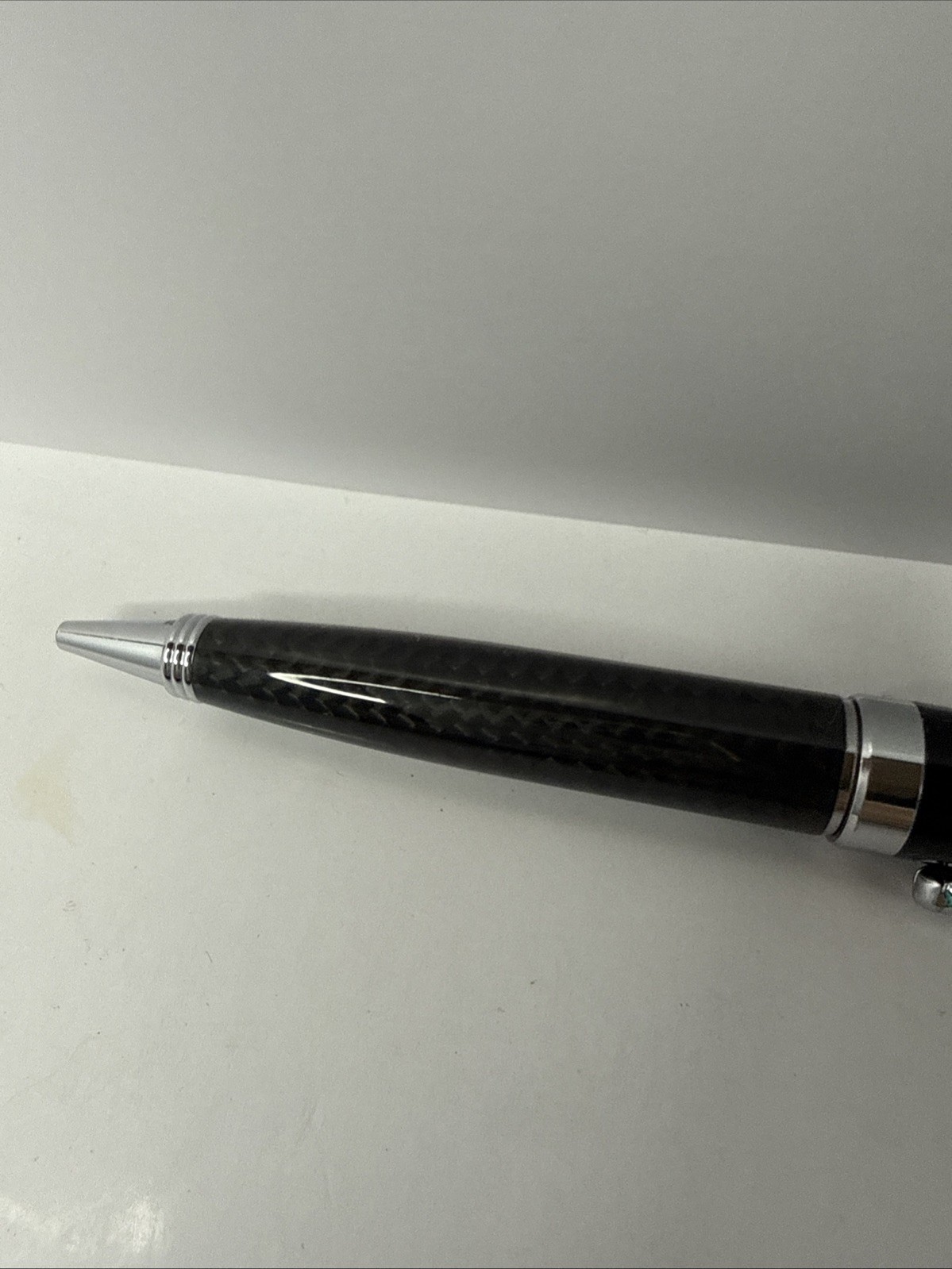 Movado Branded ballpoint pen black and carbon fiber