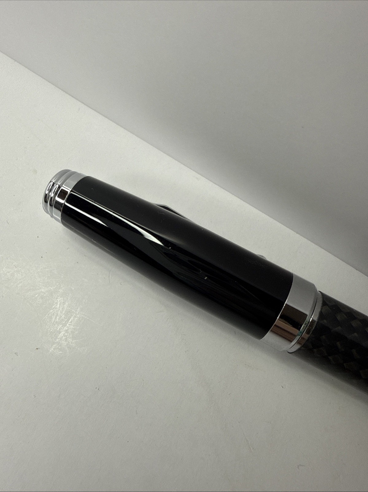 Movado Branded ballpoint pen black and carbon fiber