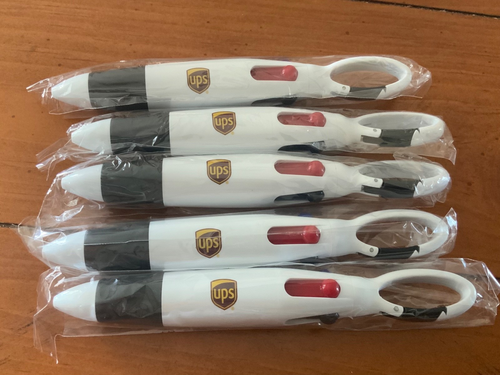 United Parcel Service (5) count lot of 4 color ink pens: red, green, blue,black