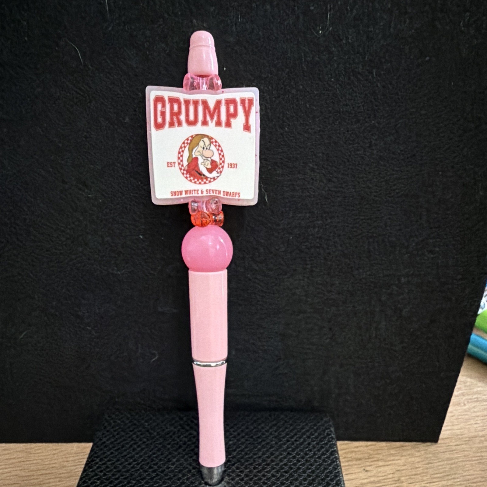 Pink Plastic Novelty Ballpoint Pen w/ «Grumpy» Character Topper, Black Ink
