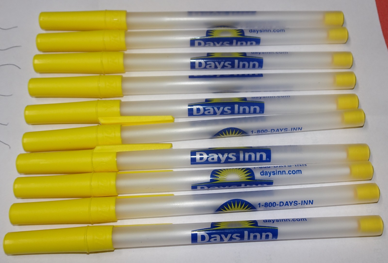 LOT OF 20 = Days Inn motel Yellow advertising stick pen = Black Ink pens