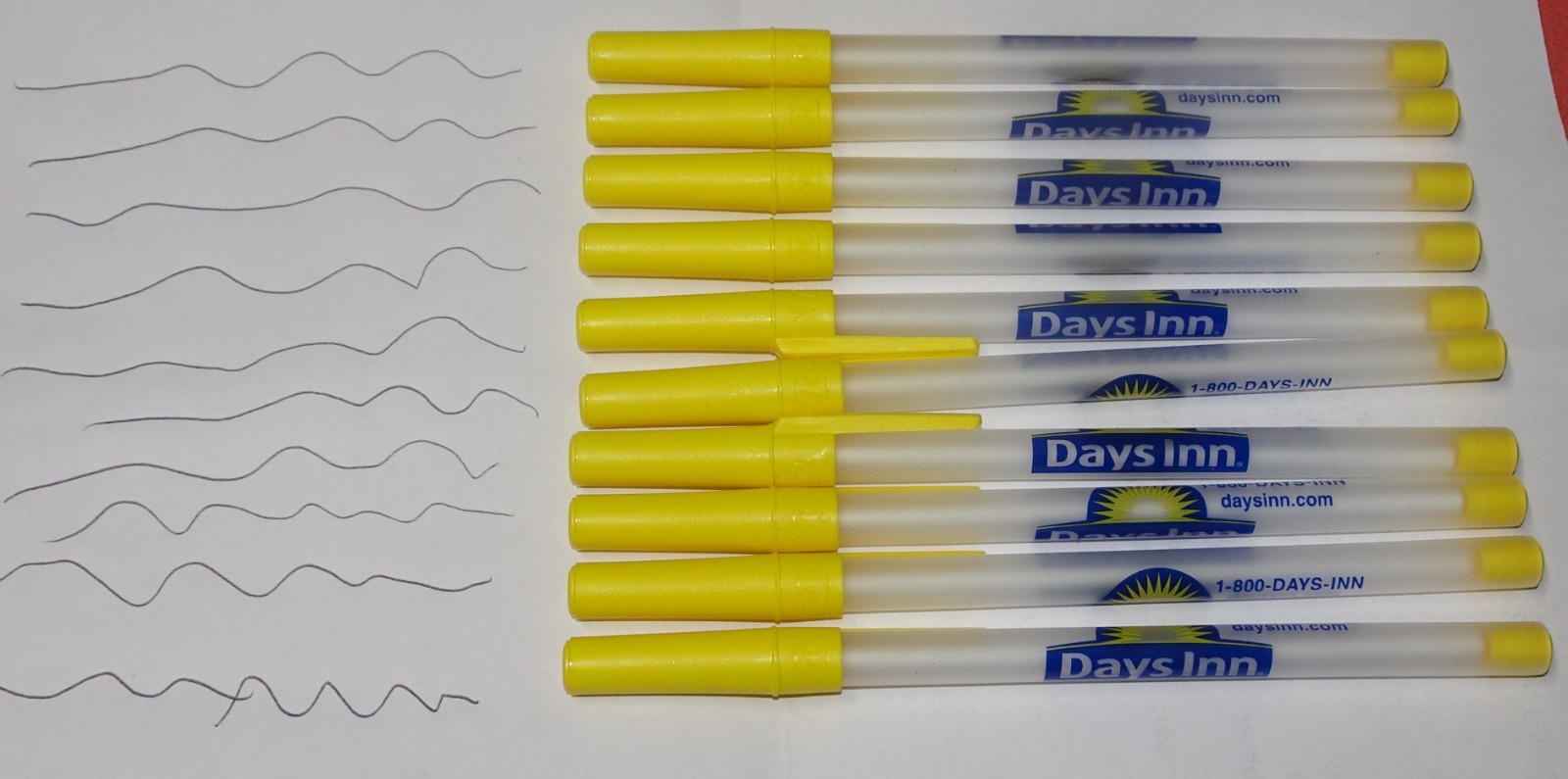 LOT OF 20 = Days Inn motel Yellow advertising stick pen = Black Ink pens