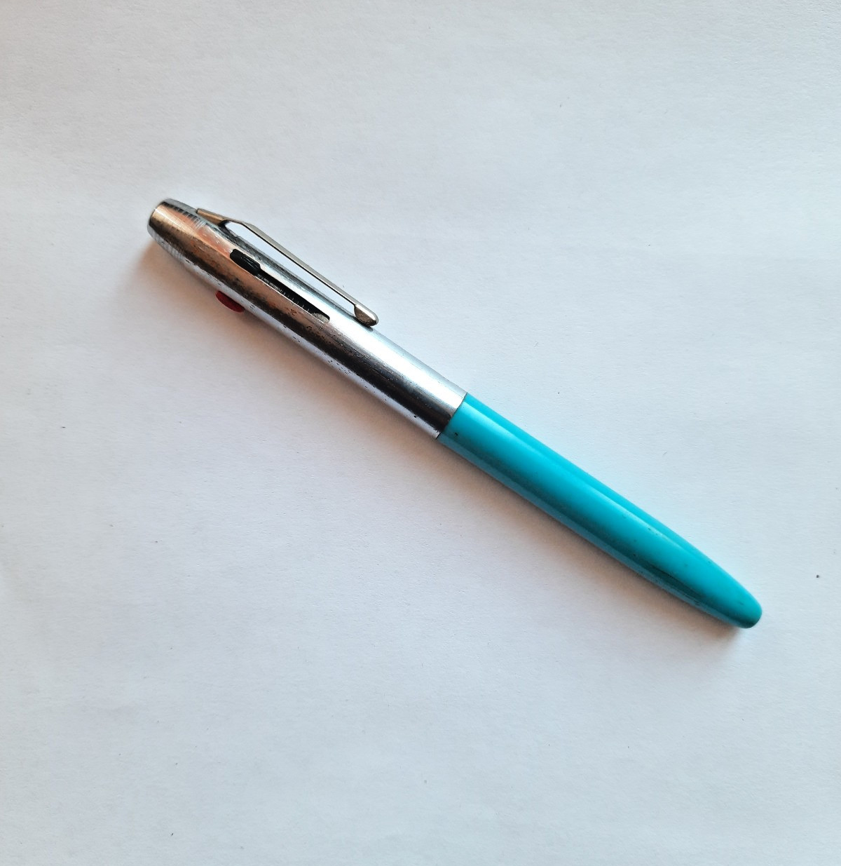 A vintage 3-color Soviet ballpoint pen from the 1970s.
