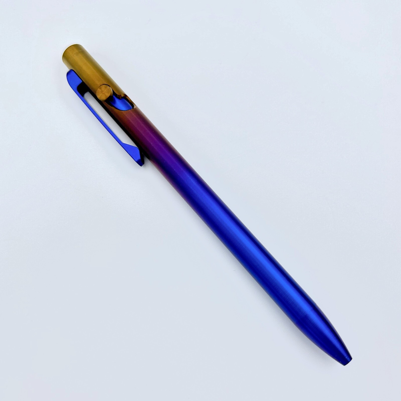 Tactile Turn – Titanium Slim Bolt Action Standard Size Pen Wyo Sunrise Ano Color