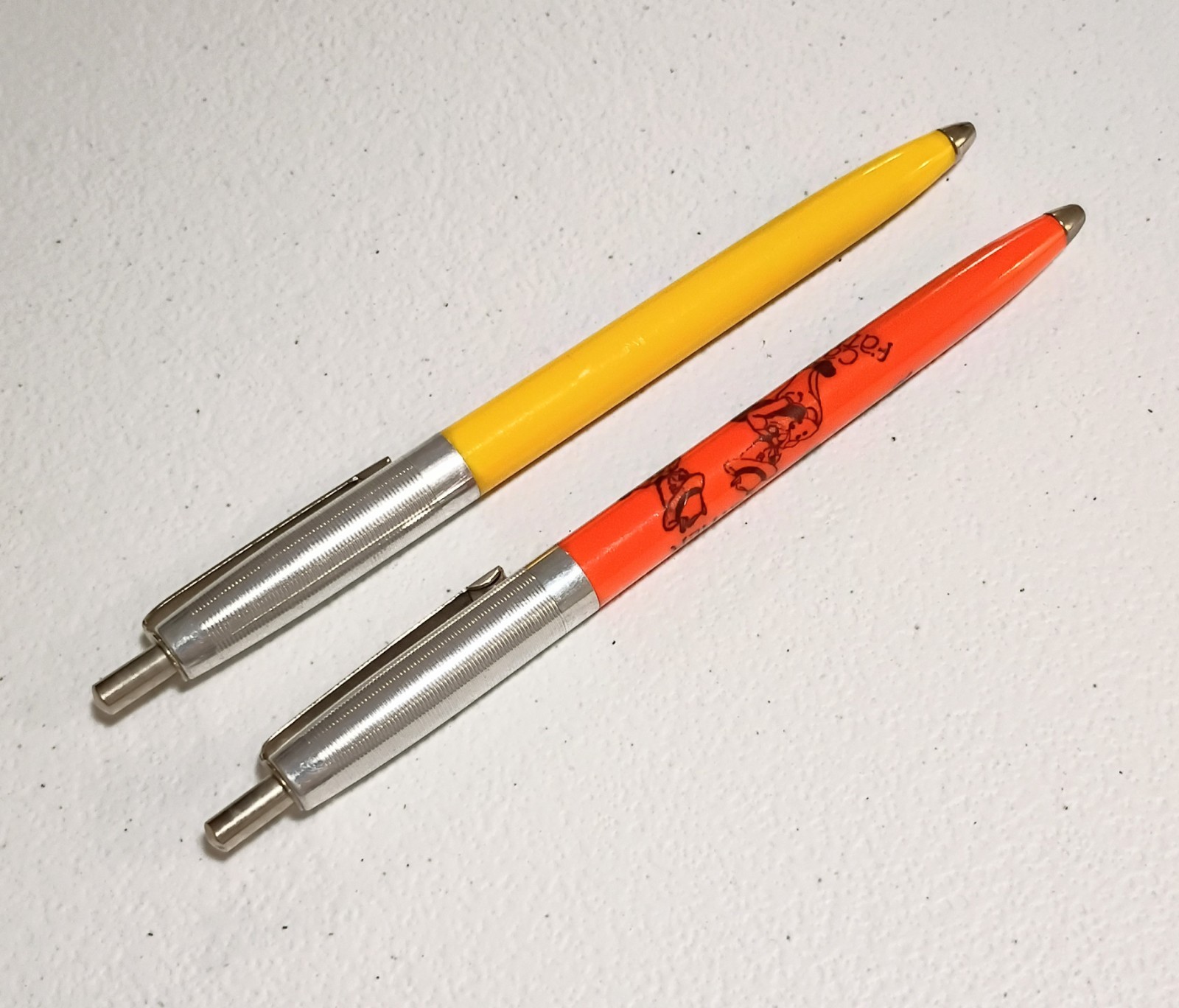 Lot of 2 Vintage Champion Ballpoint Pens Cat Father & Solid Yellow