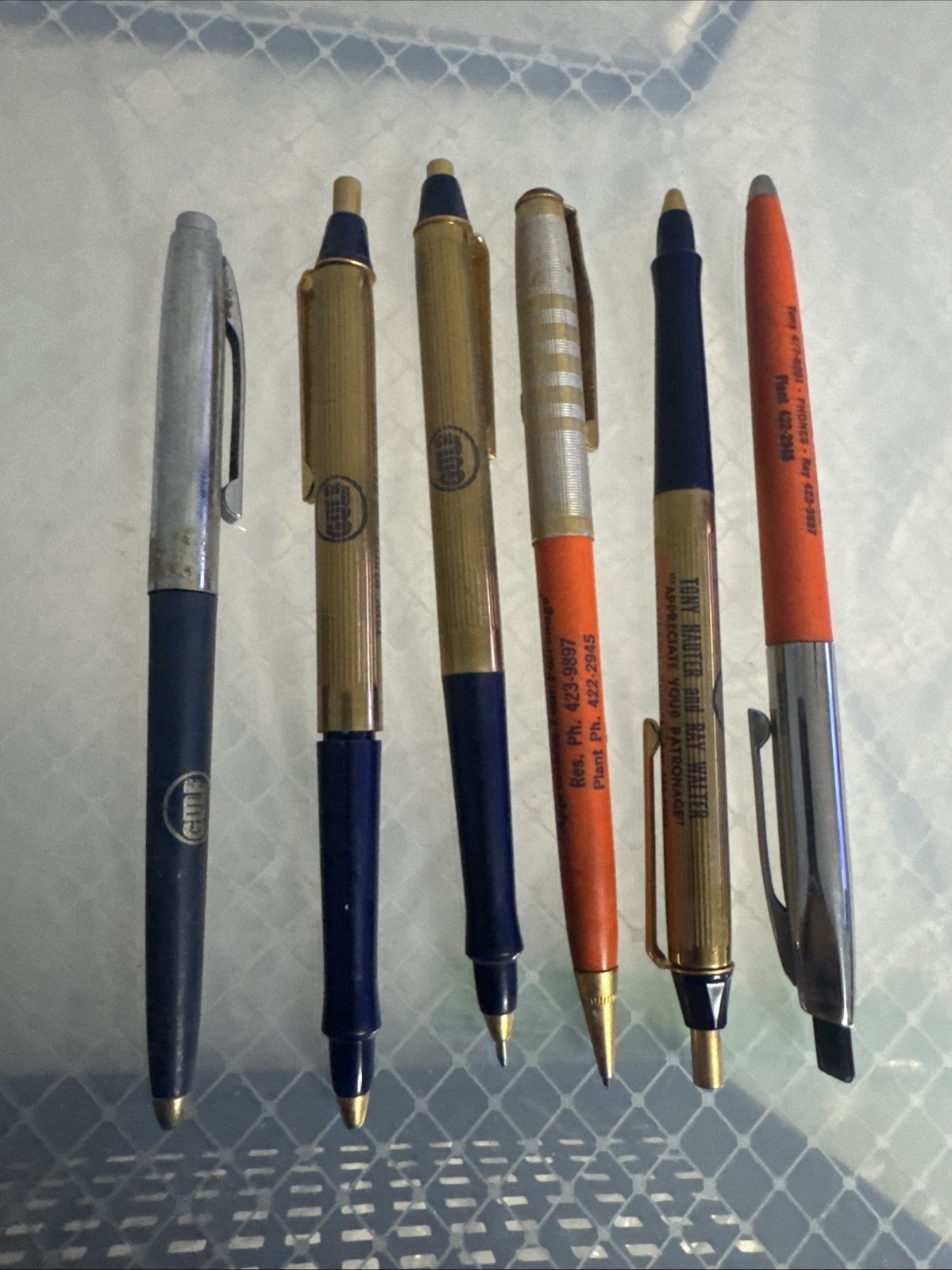 A lot of six golf oil pens made by wings nonworking