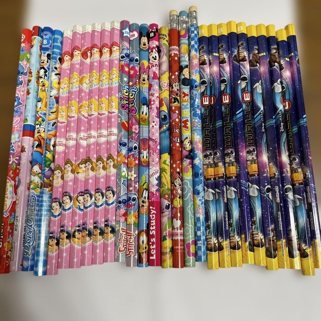 28 Disney pencils, 26 black pencils, 1 red pencil, 1 red and blue pencil #251e33