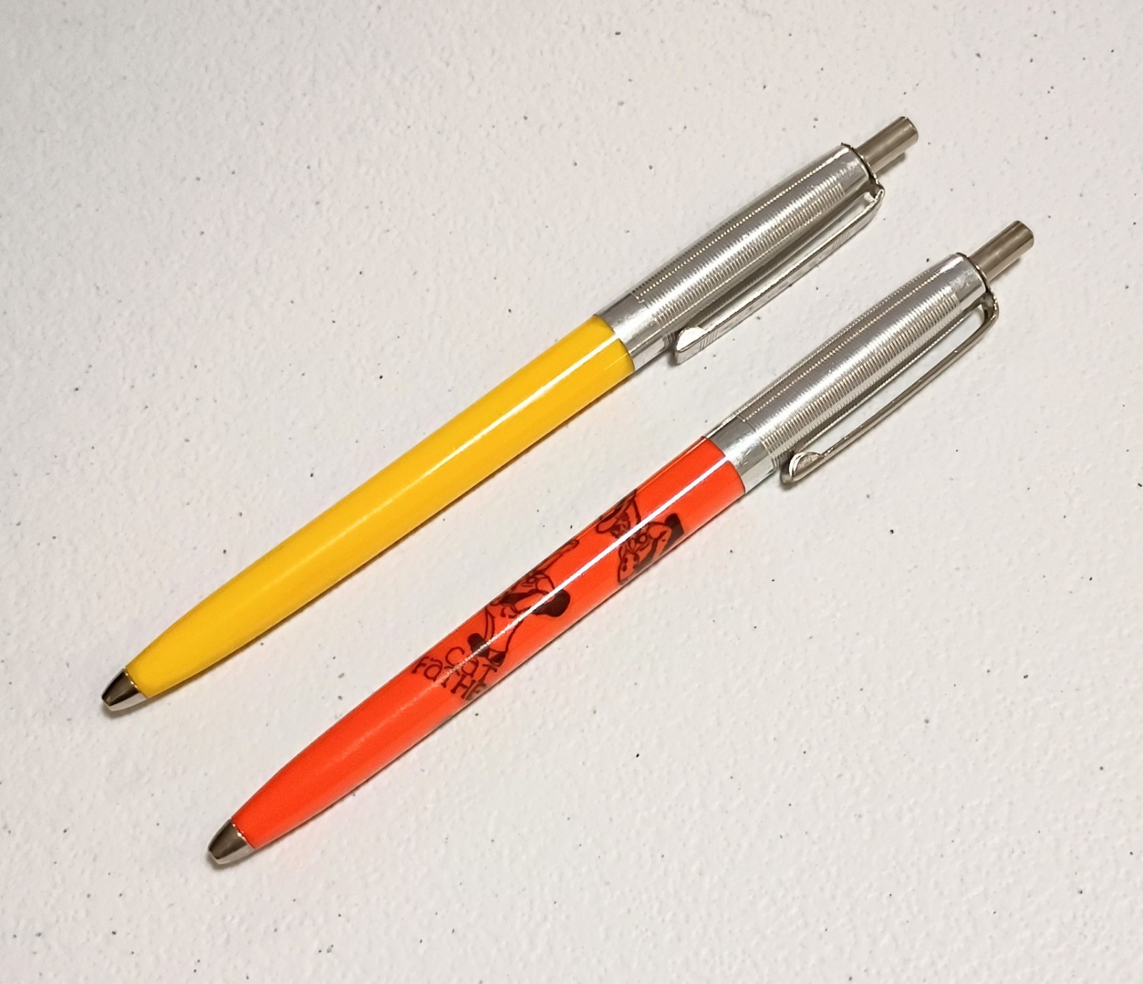Lot of 2 Vintage Champion Ballpoint Pens Cat Father & Solid Yellow