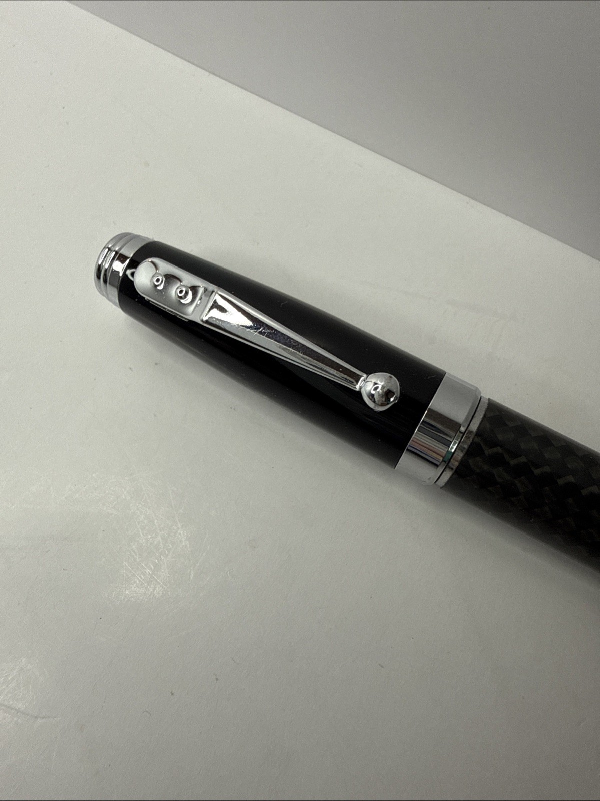 Movado Branded ballpoint pen black and carbon fiber