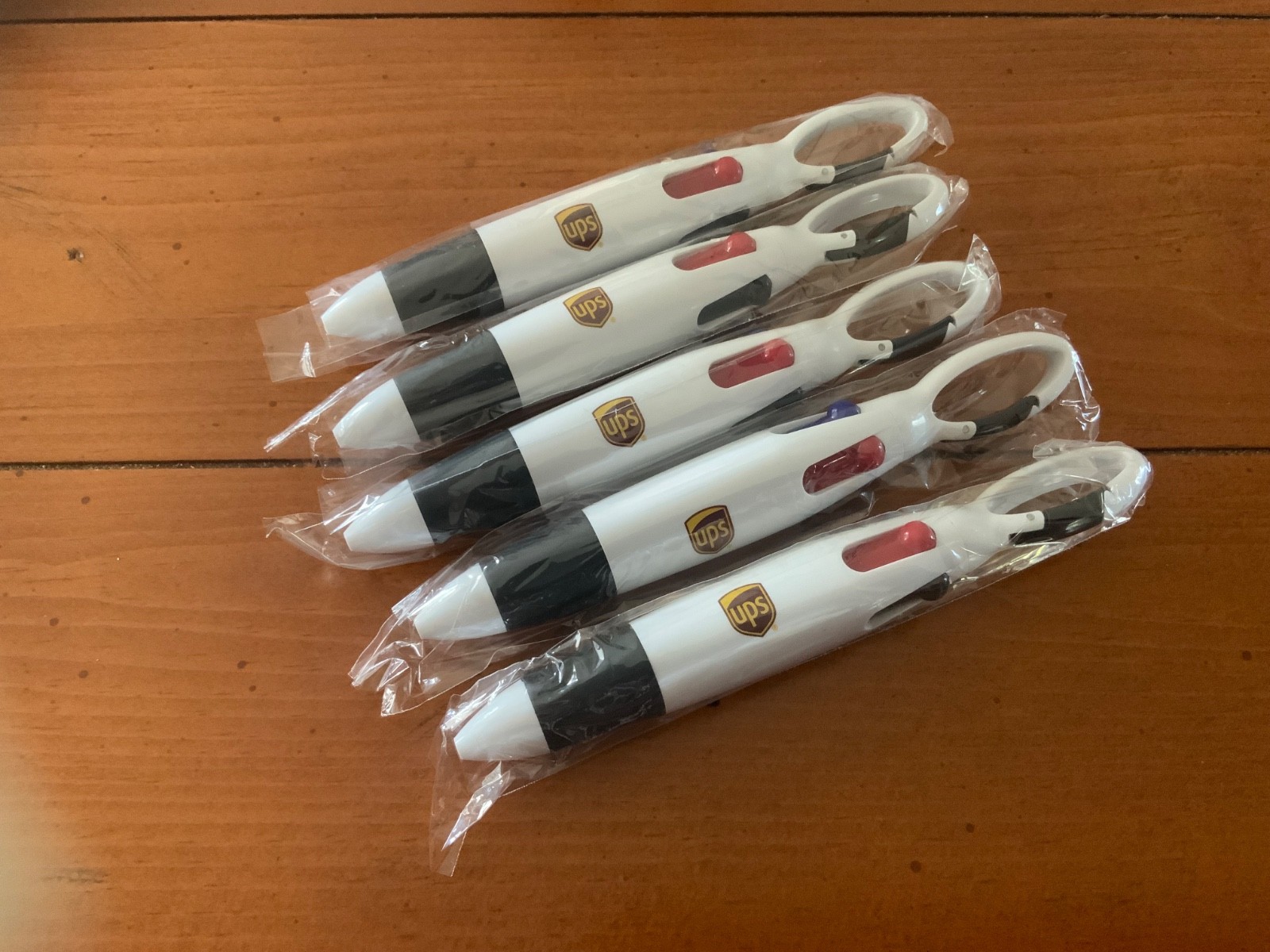 United Parcel Service (5) count lot of 4 color ink pens: red, green, blue,black