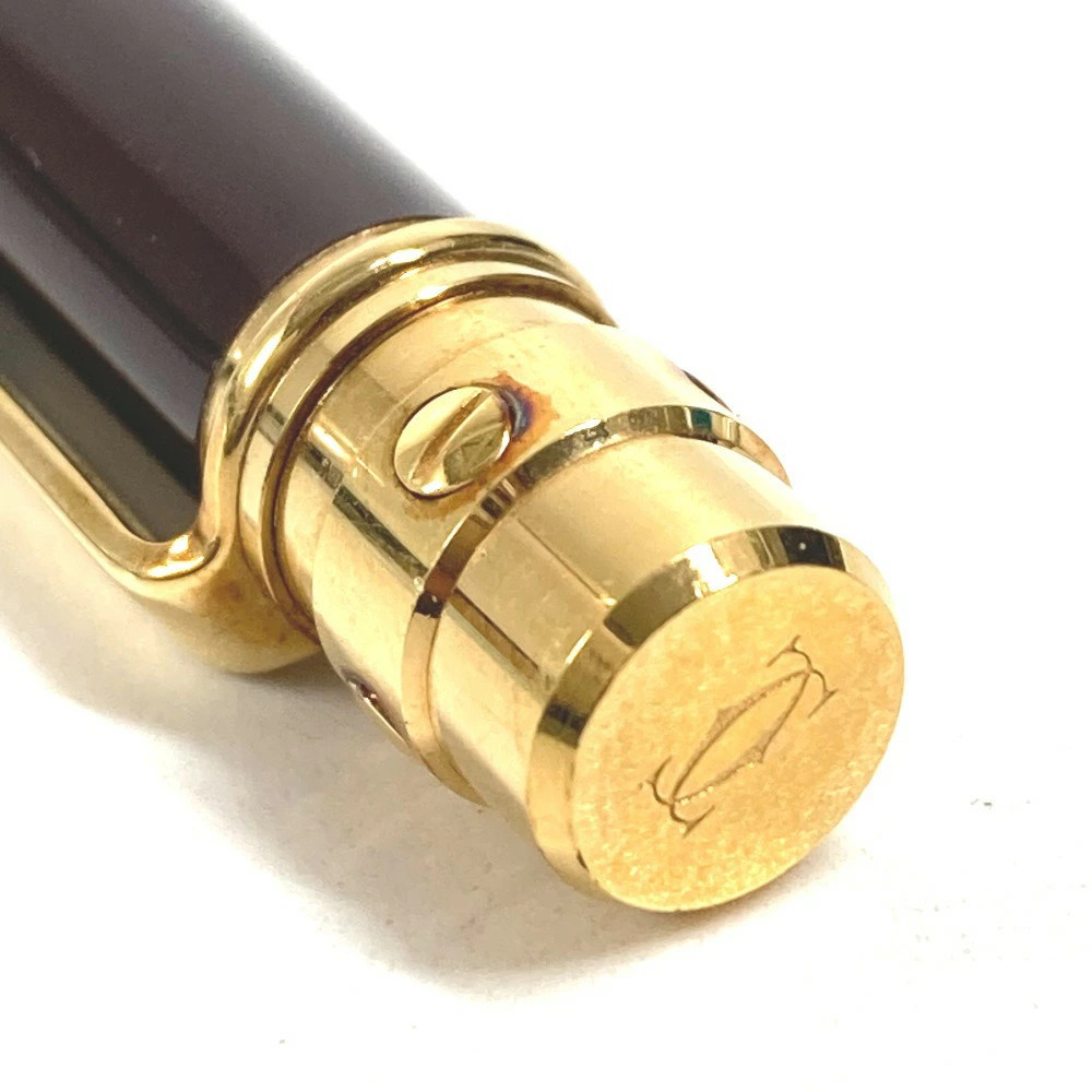 Santos de Cartier Love Ballpoint Pen Brown Resin Glack Ink Gold Twist Unisex