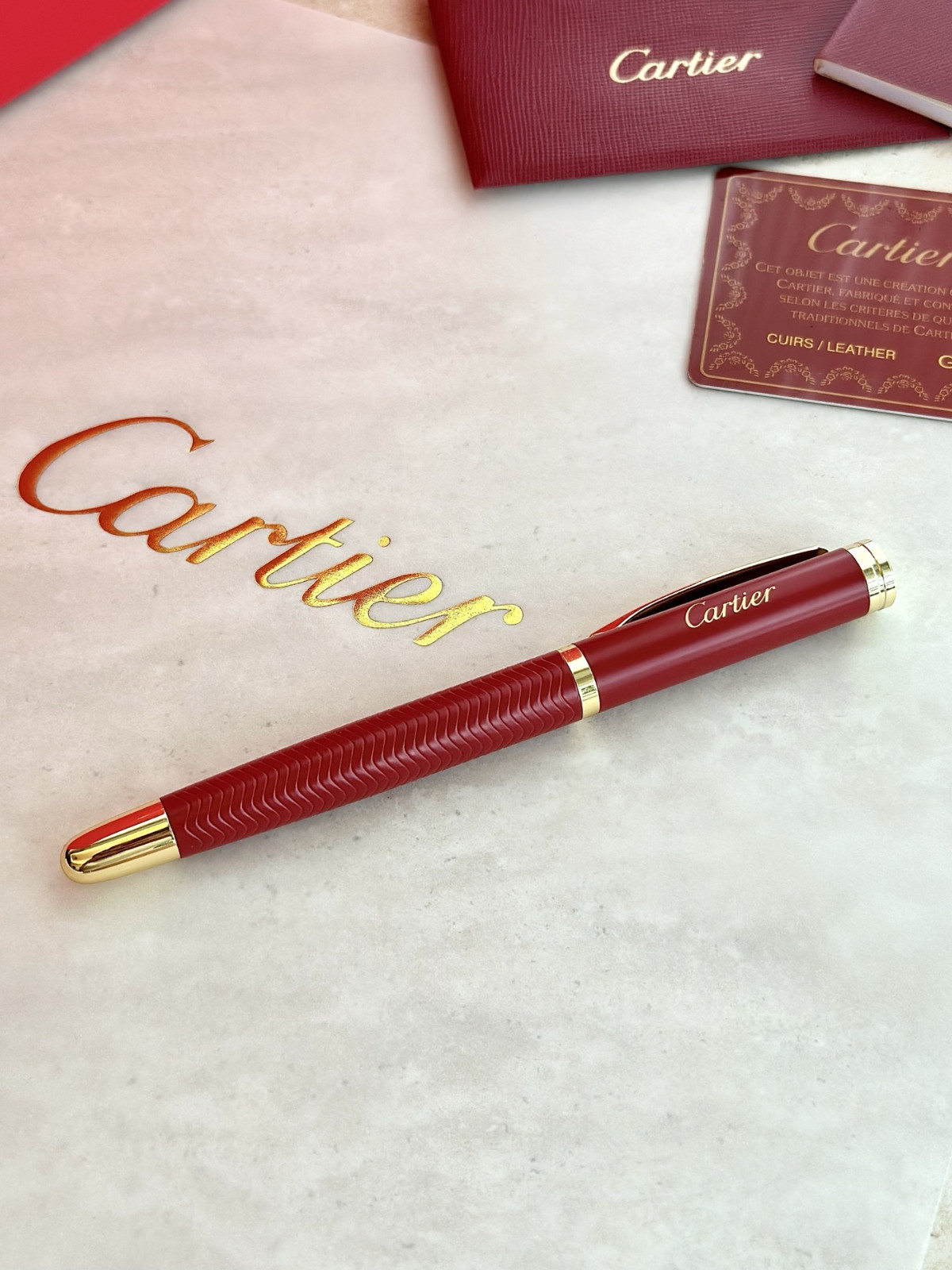 Cartier red striped ballpoint pen with box – luxury gift