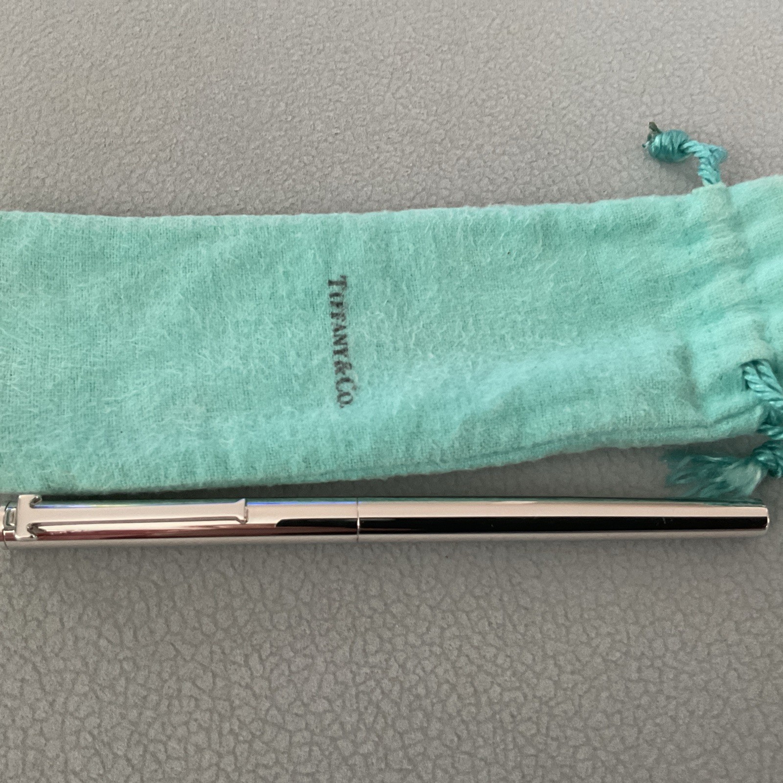 Tiffany & Co. “T” Sterling Silver Ballpoint Roller Pen Black Ink ( engraving)